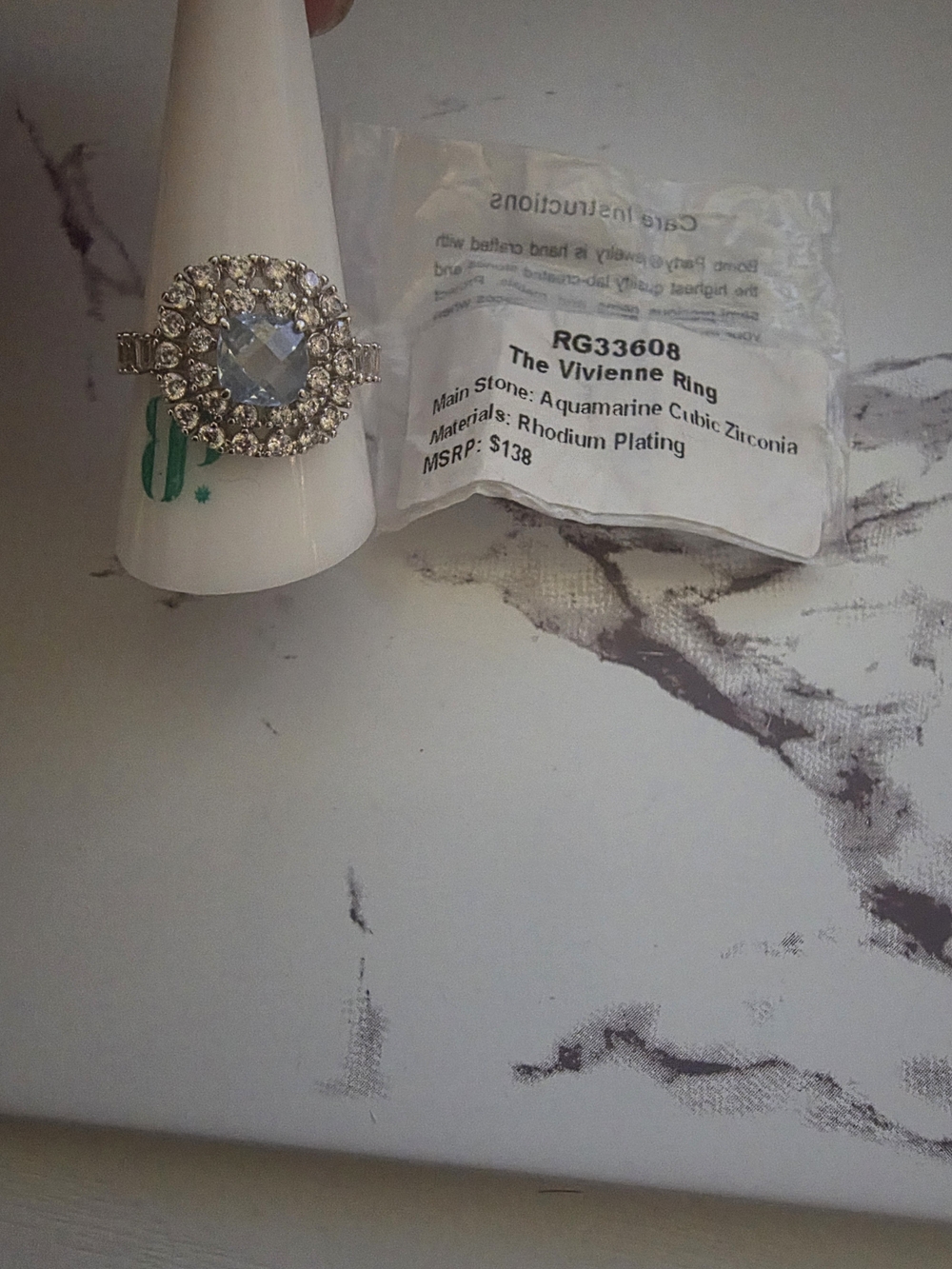 bp Vivienne Ring with Aquamarine-Center and Clear Halo
